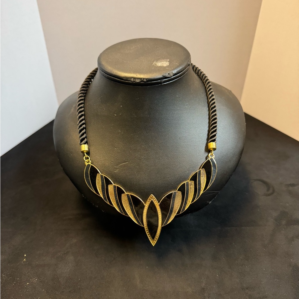 Elegant Gold and Black Necklace